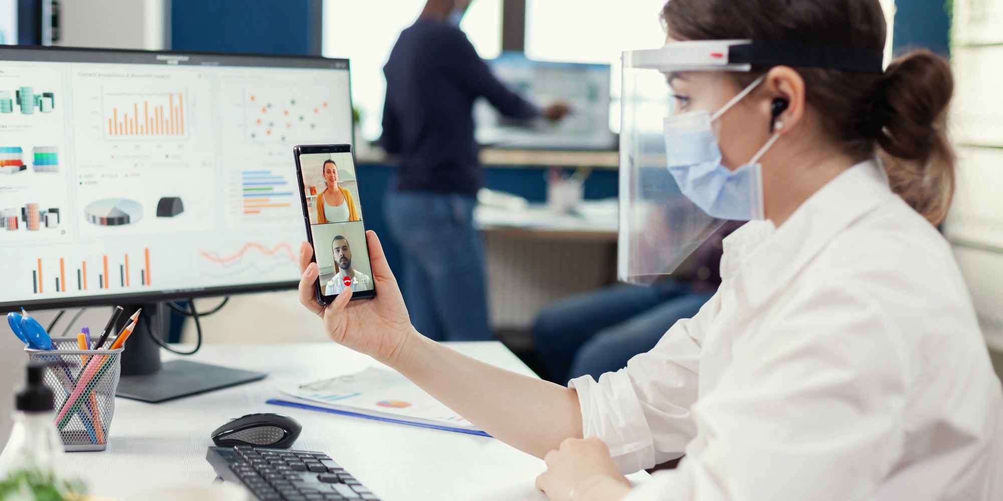 Female Doctor using digital dashboards